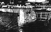 Немецкая подводная лодка, потопленная авиацией Черноморского флота в порту Констанца. Август 1944 года.